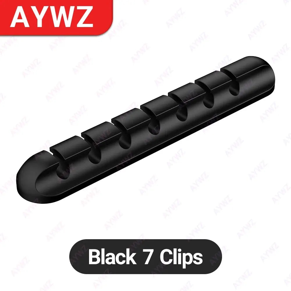 Adhesive cable holders for desk organization
